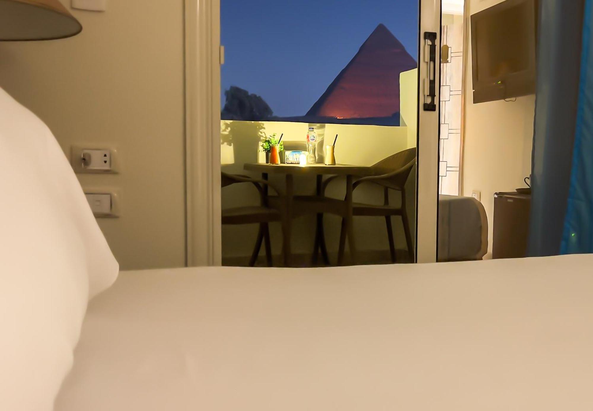 Pyramids Vista Inn Kafrat al Jabal Bagian luar foto