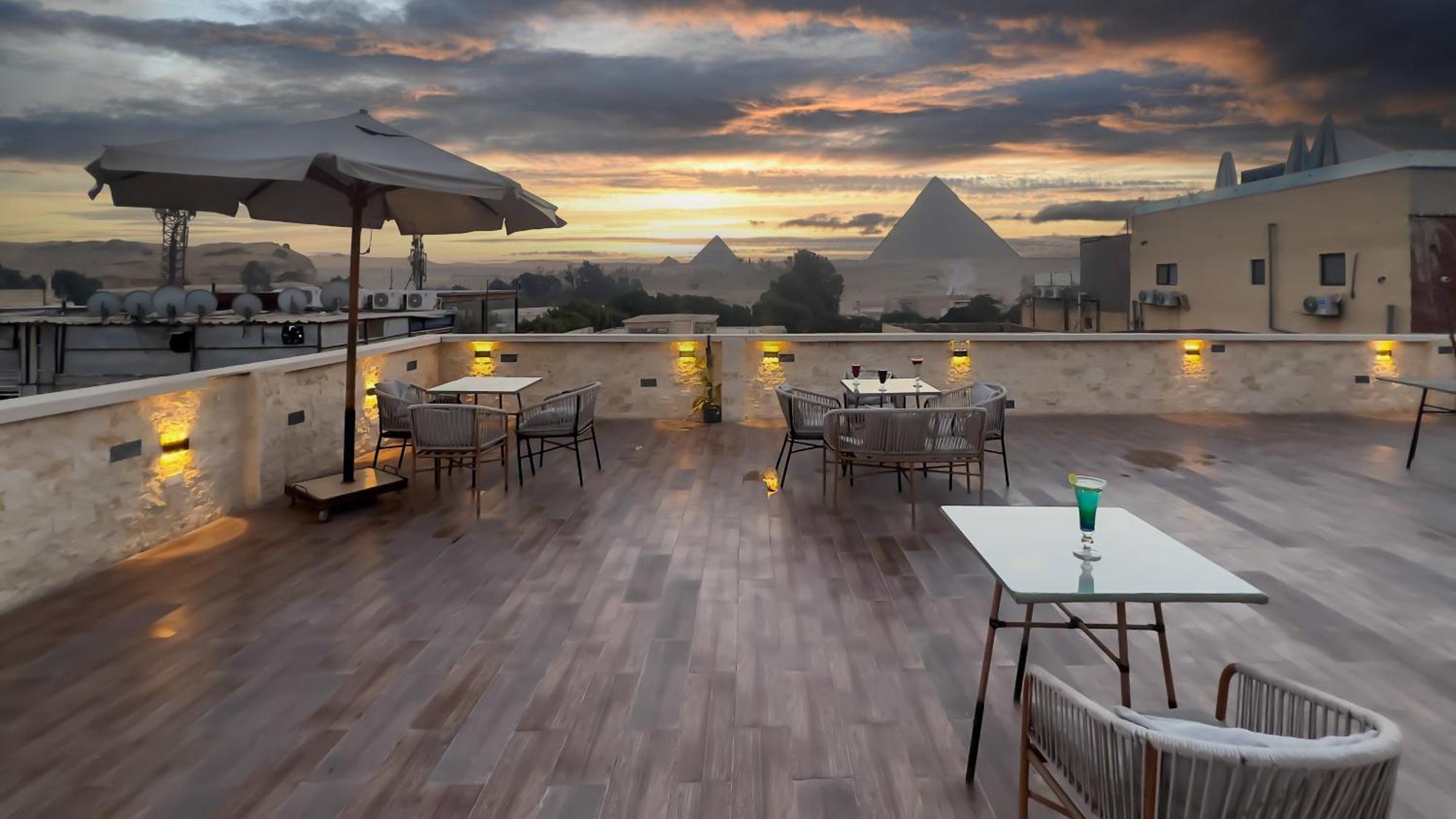 Pyramids Vista Inn Kafrat al Jabal Bagian luar foto